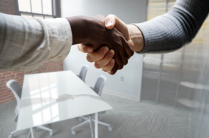 two men shaking hands