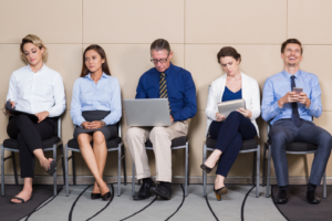Professionals in a waiting room at a professional recruiting firm in Houston